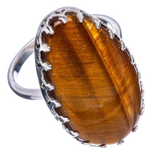 Oval tiger's eye ring with .925 sterling silver bezel and brown stone