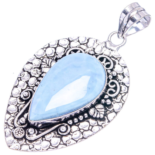 German silver opal pendant with light blue teardrop stone and top loop bail