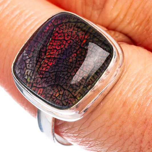Sterling silver oval opal ring with iridescent purple-blue-green stone