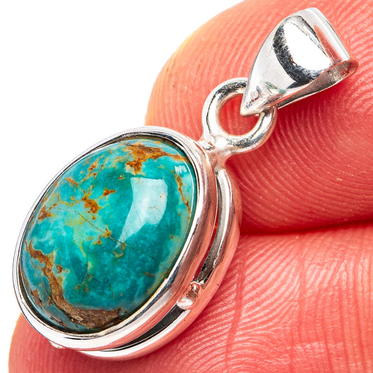 Turquoise oval cabochon pendant in .925 sterling silver with side loop bail