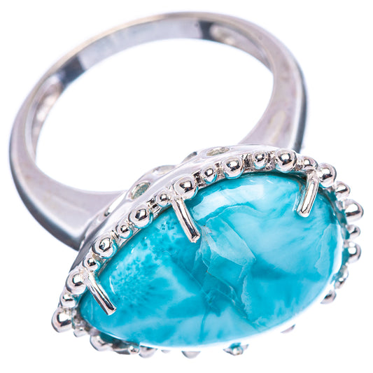 Sterling silver ring with oval blue larimar gemstone in prong and beaded halo setting