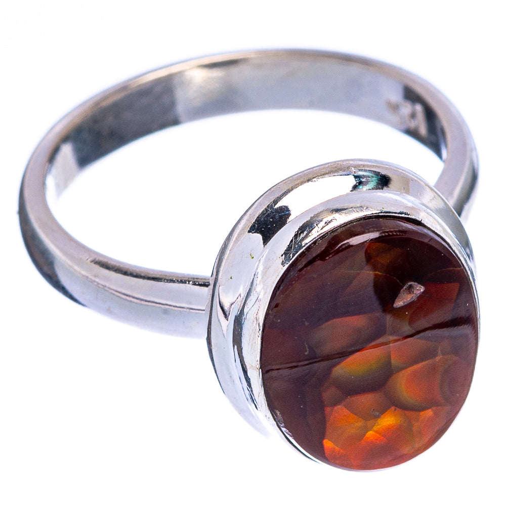 Sterling silver oval fire agate ring, side view, dark red-brown stone with orange glow