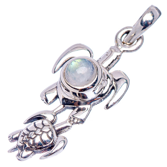 Sterling silver turtle pendant with iridescent moonstone cabochon and dangling shell charm