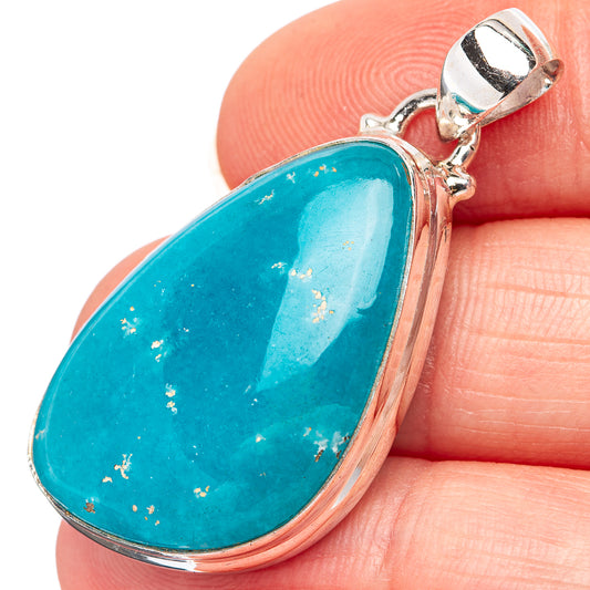 Turquoise teardrop pendant in .925 sterling silver with scalloped bezel and bail