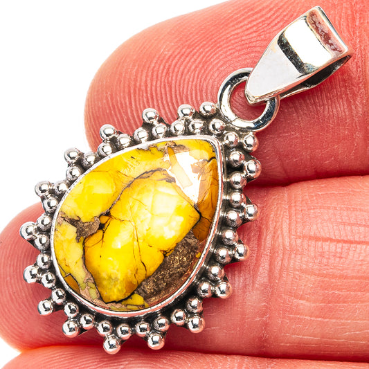 Sterling silver pendant with yellow teardrop stone and bead halo, bail top