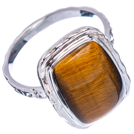 Sterling silver ring featuring rectangular tiger's eye cabochon and detailed shank