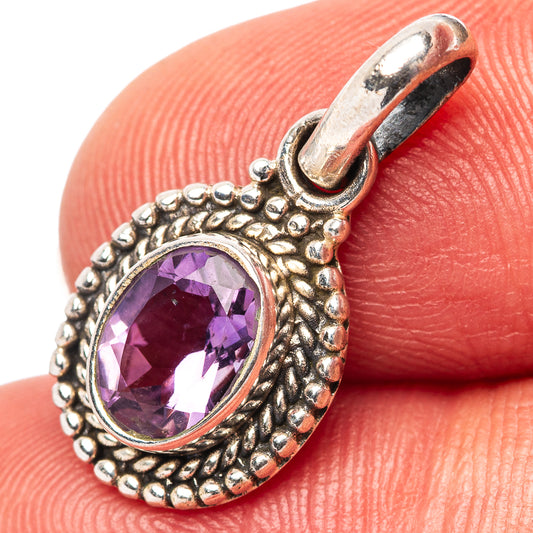 Amethyst pendant in .925 sterling silver with oval faceted purple stone, ornate bead frame