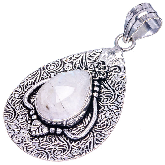 German silver oval moonstone pendant, engraved scrollwork border and flower detail