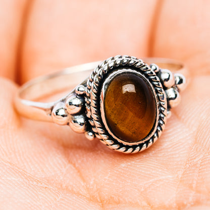 Tiger's eye oval gemstone dainty sterling silver ring with ornate side settings