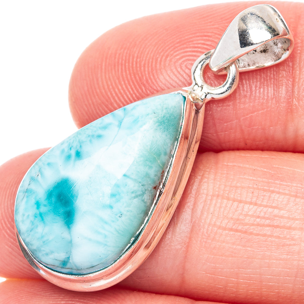 Sterling silver Larimar teardrop pendant close-up, polished bezel and jump ring bail