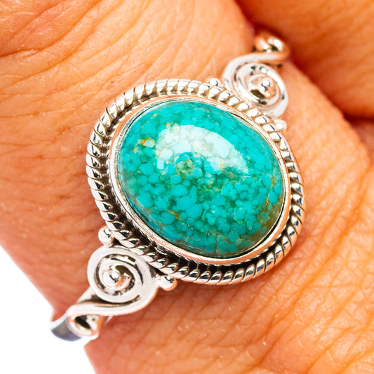 Sterling silver turquoise ring with oval cabochon and ornate bezel, small scroll details