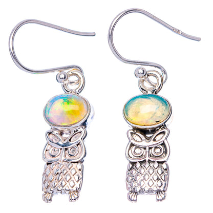 Sterling silver owl drop earrings with oval opal cabochons and textured body