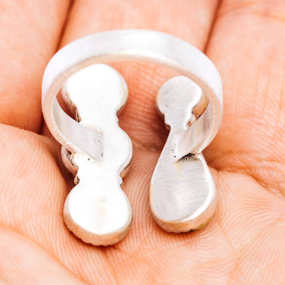 Adjustable sterling silver ring band, open back with curved cutout ends