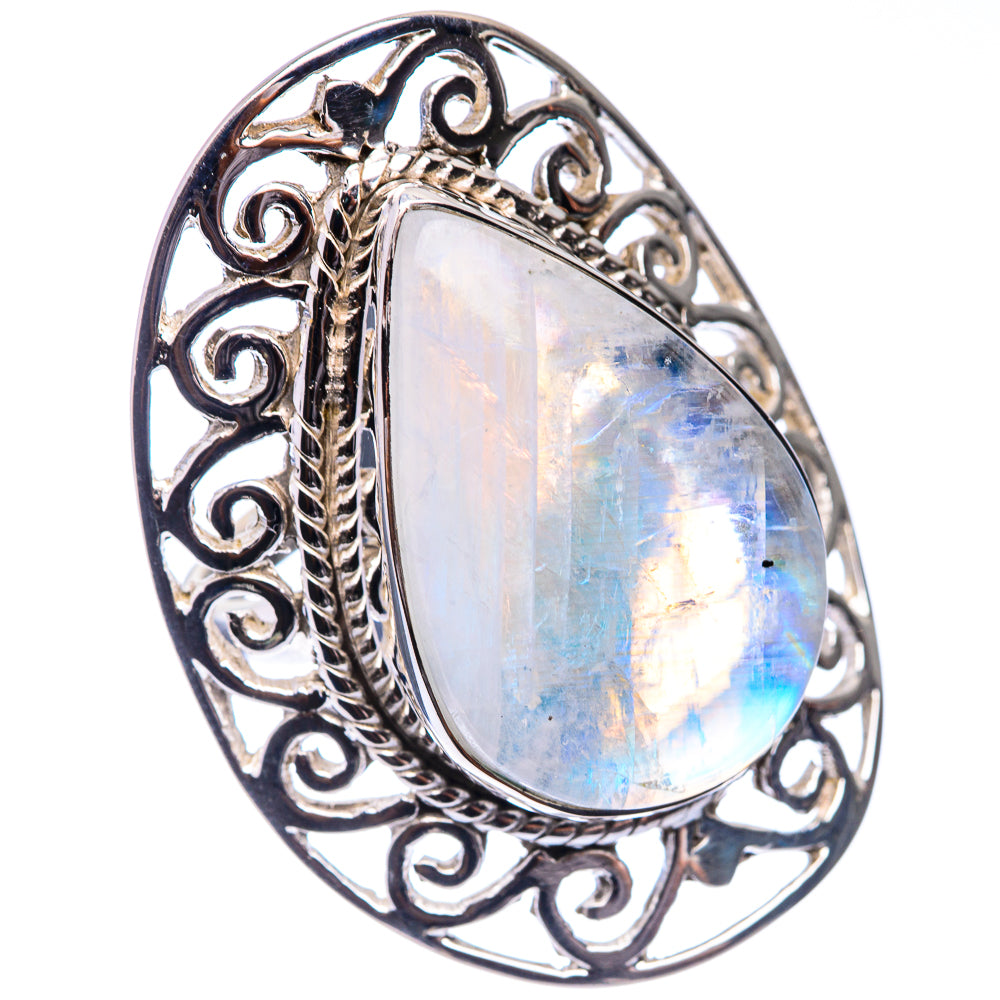 Sterling silver oval moonstone ring with blue-white iridescence and filigree border