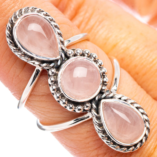 Sterling silver ring with three rose quartz cabochon ovals and braided details