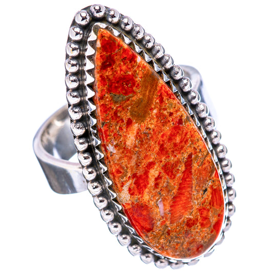 Adjustable size 8 sterling silver ring with teardrop orange-red coral stone and beaded rim