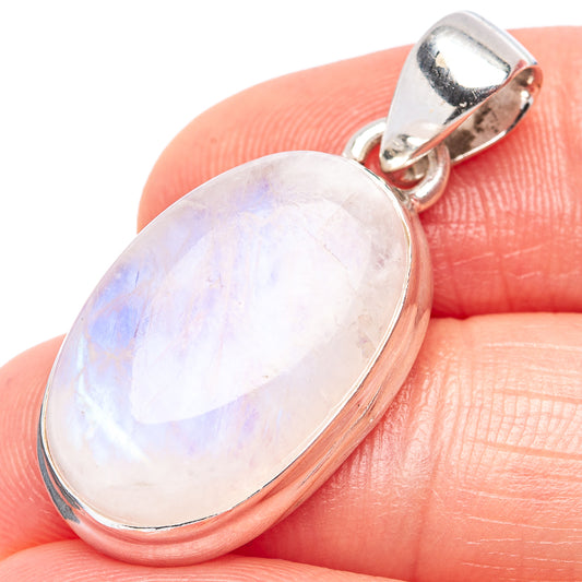 Pink opal pendant in oval sterling silver bezel, close-up on iridescent stone