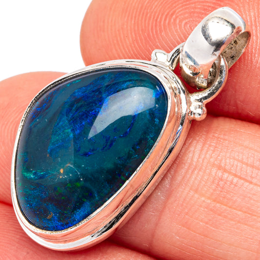 Oval opal pendant detail, .925 sterling silver setting and bail, vivid blue iridescence