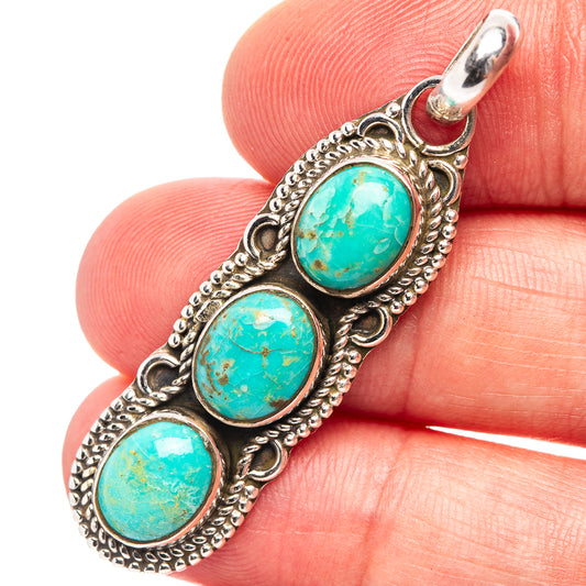 925 sterling silver turquoise cabochon pendant with three oval stones and ornate frame