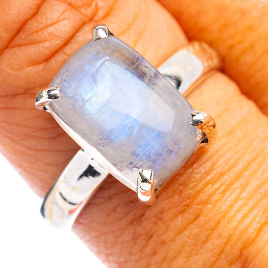 Moonstone statement ring with rectangular iridescent light-blue stone and silver band