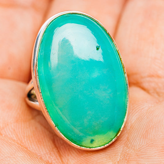 Size 7 chrysoprase oval ring in .925 sterling silver, green-blue center stone on hand