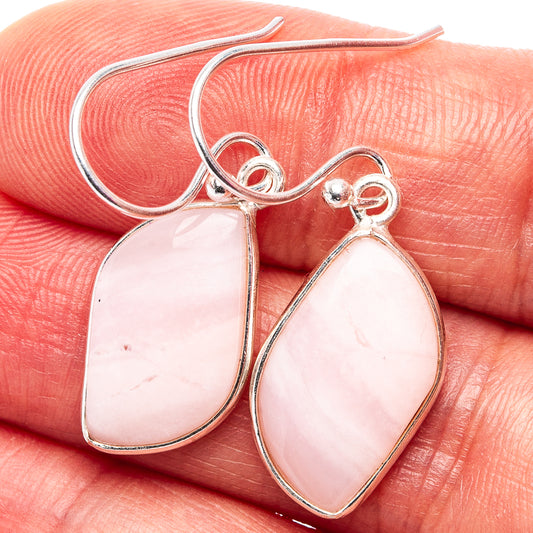 Sterling silver teardrop opal earrings with pink cabochon, French hook backs
