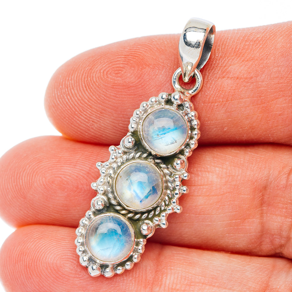 Sterling silver moonstone pendant with three oval rainbow cabochons in ornate settings