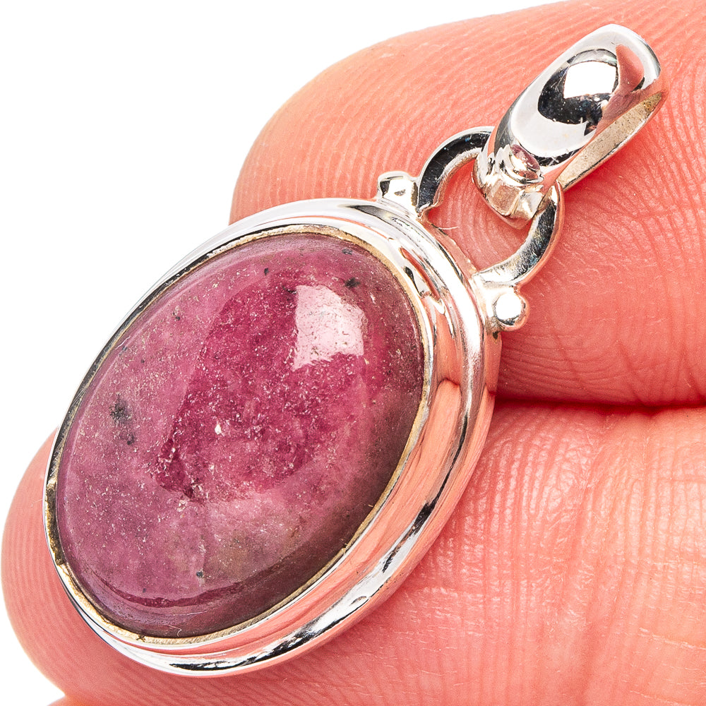Oval rhodonite pendant with pink-purple stone in .925 sterling silver bezel