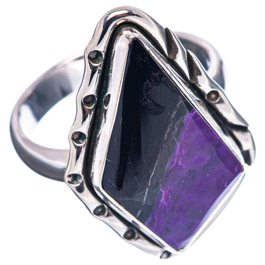 Sterling silver ring, dark purple sugilite in raised bezel with decorative metal sides