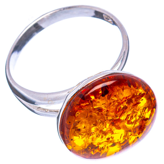 Oval Baltic amber cabochon ring with .925 sterling silver band, polished silver finish