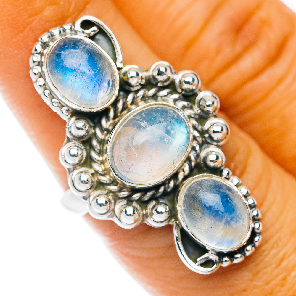 925 sterling silver moonstone ring with three oval opalescent stones, beaded halo