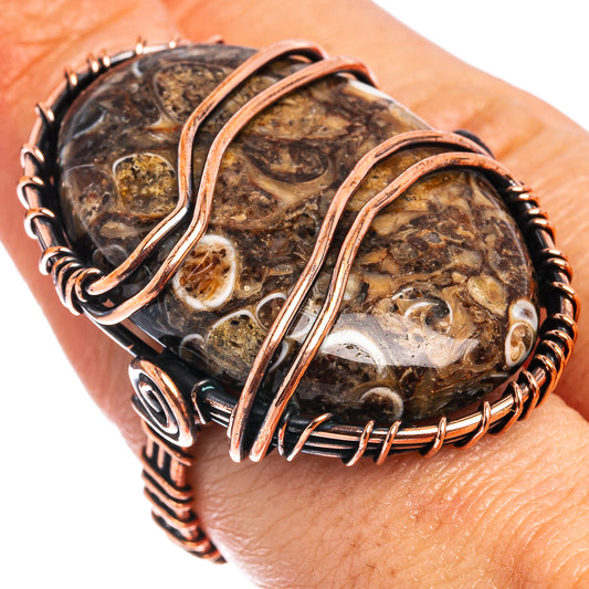 Oxidized copper wire wrap agate ring with oval mottled stone and open copper band