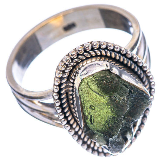 Sterling silver moldavite ring featuring green stone in raised bead-edged setting