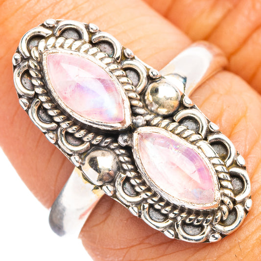 Sterling silver pink moonstone double-oval ring with ornate filigree and open setting