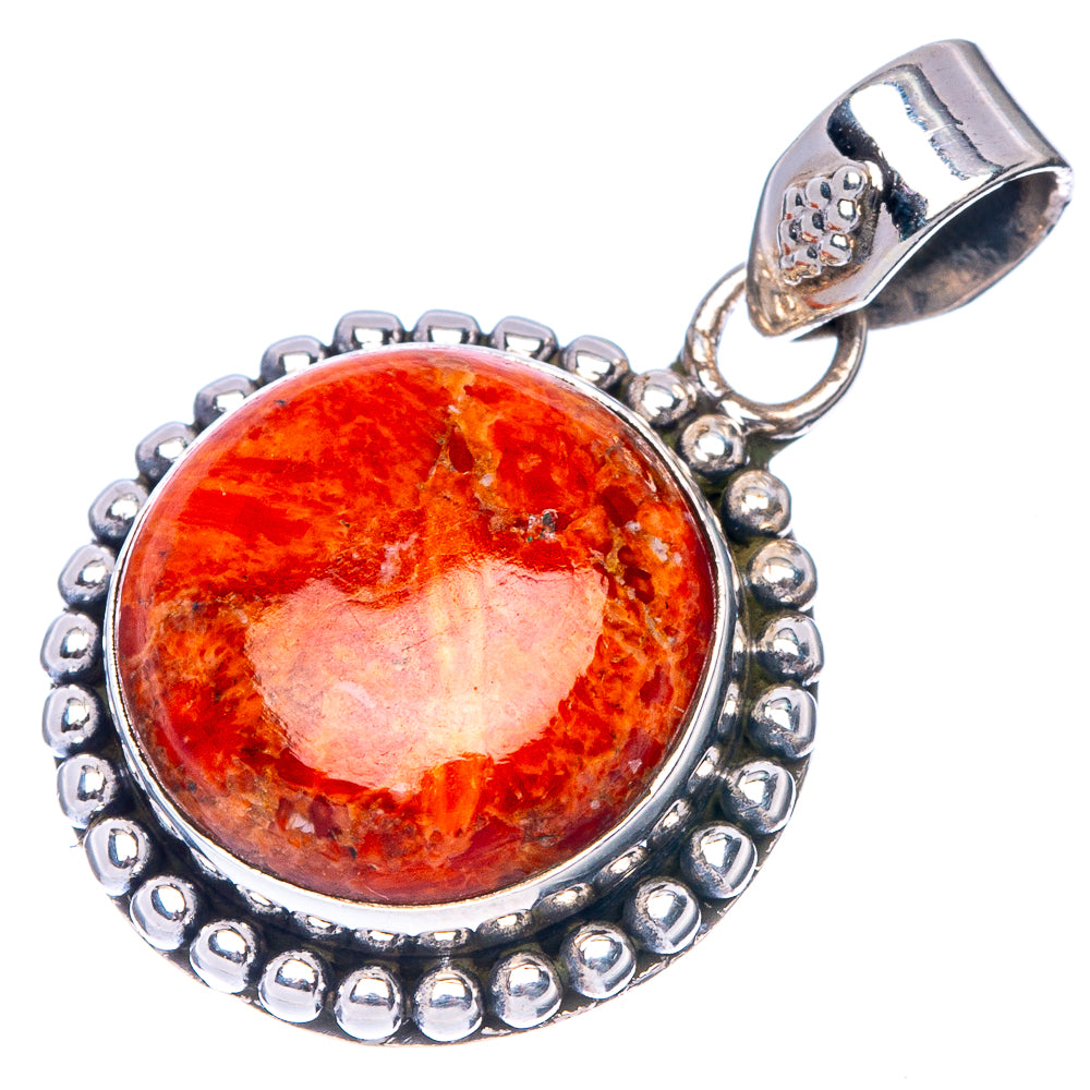 Oval orange coral cabochon silver pendant, textured bezel with bead trim and loop bail
