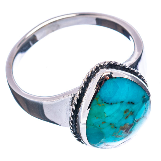 Turquoise cabochon sterling silver ring, oval setting and band in side view