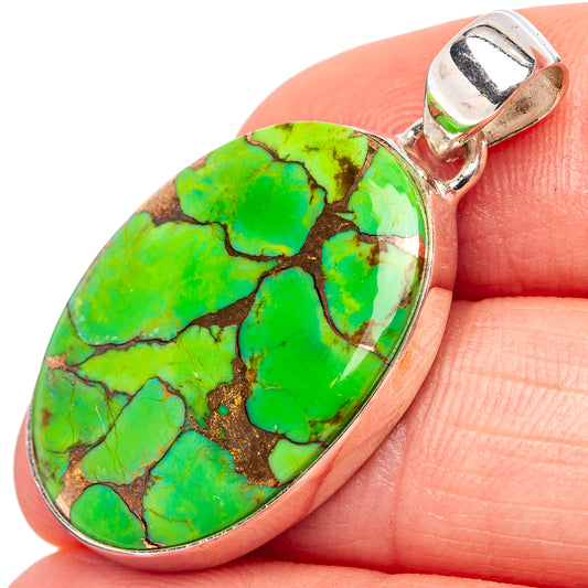 Green turquoise oval pendant with sterling silver bezel and top bail