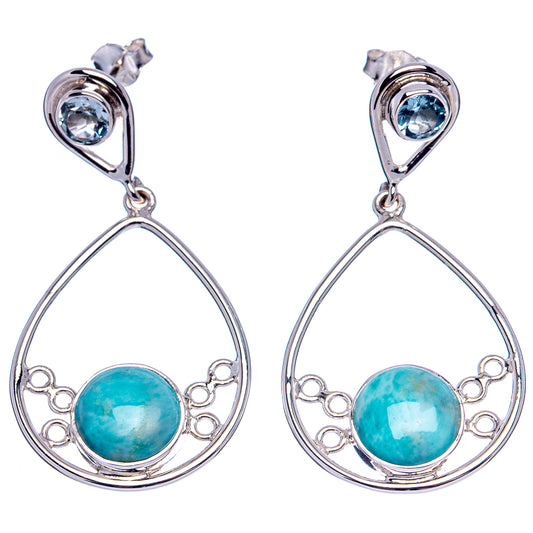Pair of sterling silver teardrop dangle earrings with blue Larimar oval centers and round stud stones