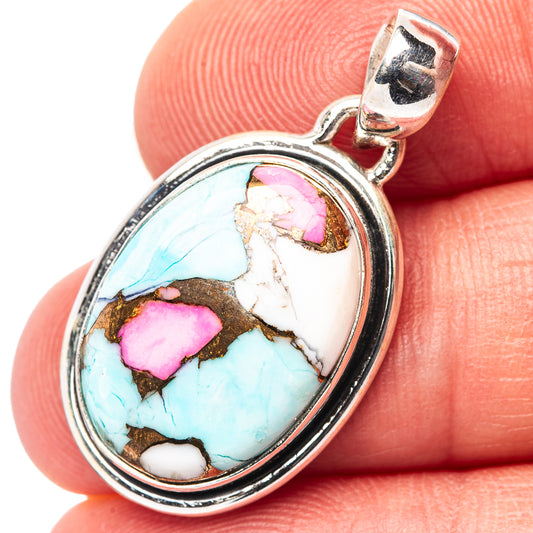 Sterling silver oval turquoise pendant with pink gemstone accents