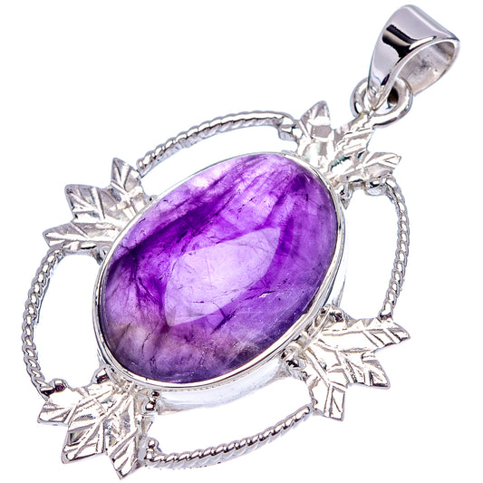 Oval amethyst cabochon pendant in .925 sterling silver with starburst side frames and bail
