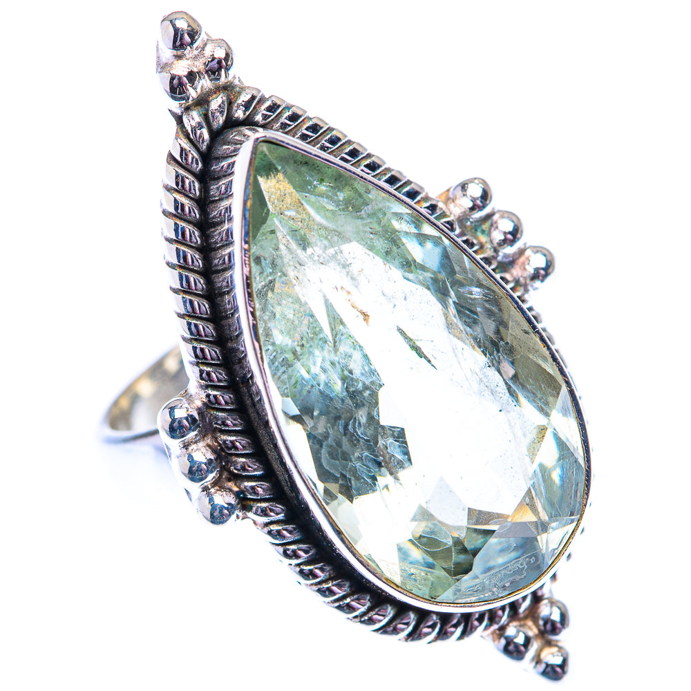 Sterling silver ring with faceted green amethyst teardrop and ornate split band