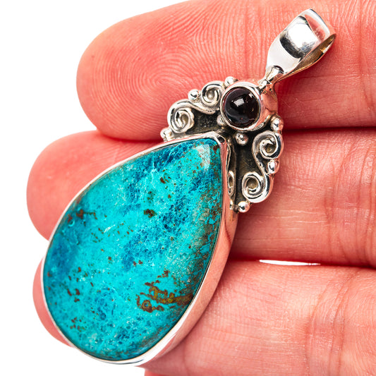 Turquoise teardrop pendant with garnet stone in ornate .925 sterling silver setting
