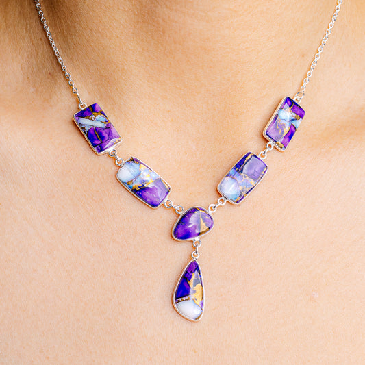 Sterling silver necklace with purple iridescent teardrop and square gemstone links