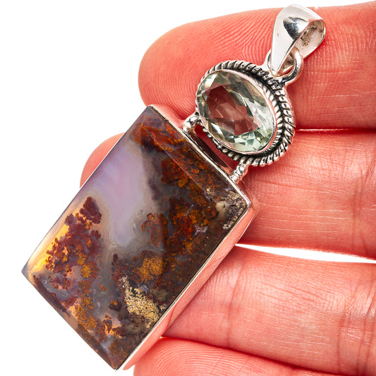 Sterling silver pendant with rectangular plume agate and green oval gemstone