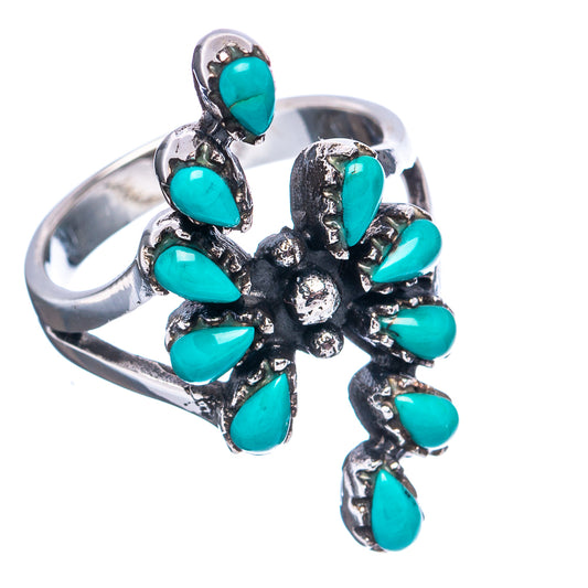 Sterling silver turquoise cluster ring with curled metal prongs and teardrop stones