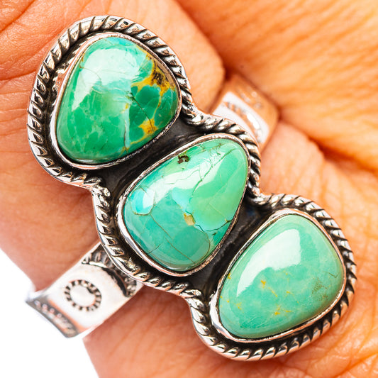 925 sterling silver ring with three green-blue turquoise cabochons, ornate bezel