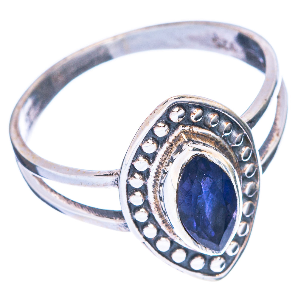 Sterling silver tanzanite ring side view with faceted oval blue-violet gemstone bezel