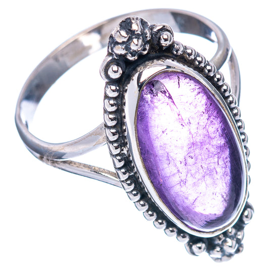 Sterling silver amethyst oval ring with ornate beaded setting and purple center stone