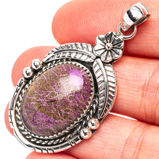 Sterling silver purpurite pendant with round purple stone and floral bail detail