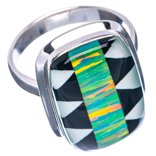 Oval opal-inlay sterling silver ring with black-and-white checker face, green iridescence